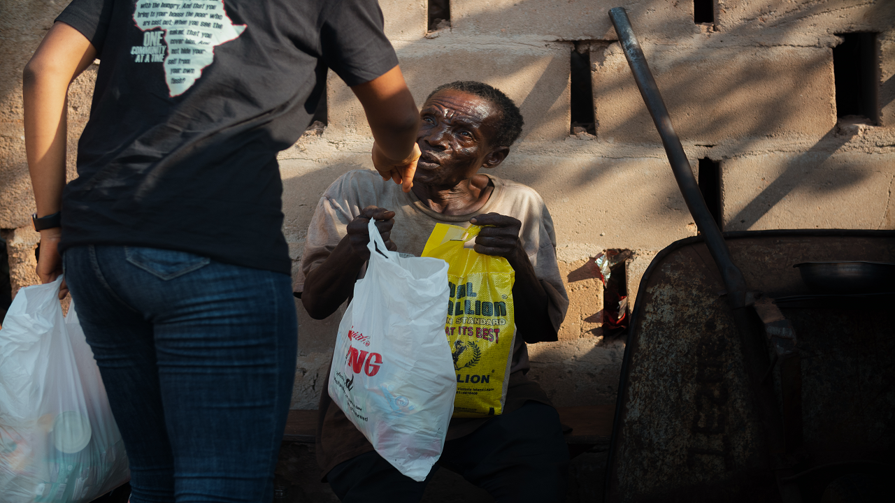 Sharing Bread to homeless man